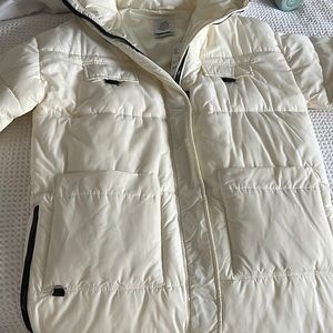 Web exclusive, urban outfitters long, white puffer jacket. Never worn, brand new